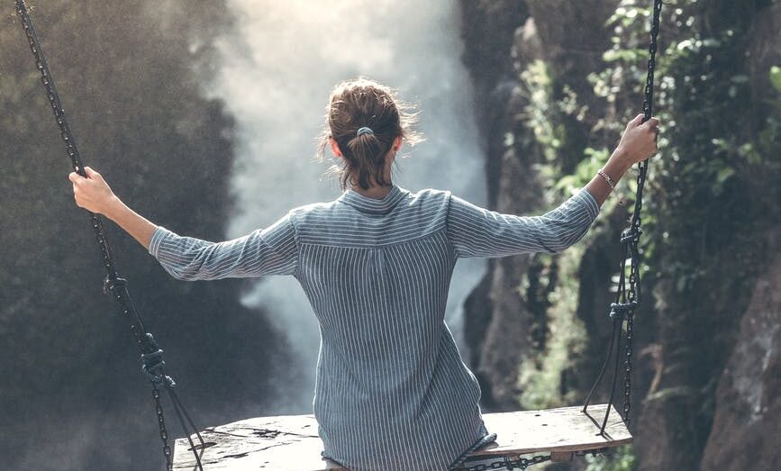 woman wearing grey long sleeved top photography